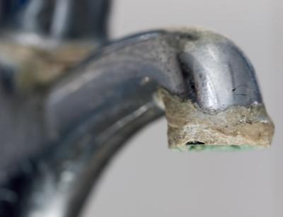 sediment buildup on faucet